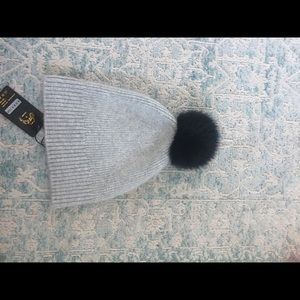 Gray wool hat with black pompom